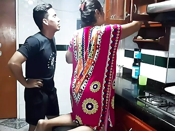 Diana Prince tries to sate her son with her coochie in the kitchen