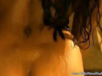 Indian stunner is dancing and leisurely taking off her clothes, knowing that someone is observing her