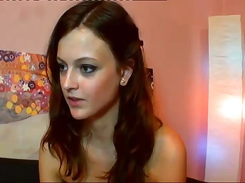 Horny honey uses crimson dildo to make her cum